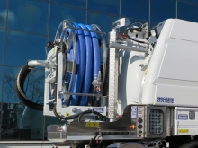 Suction boom and suction hose reel